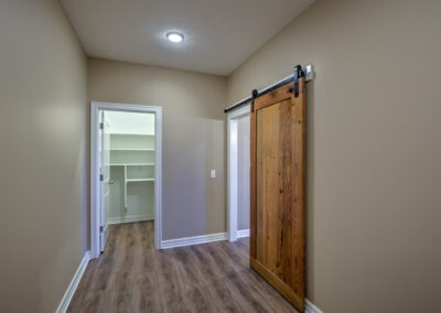 sliding barn door wooden floor storage room