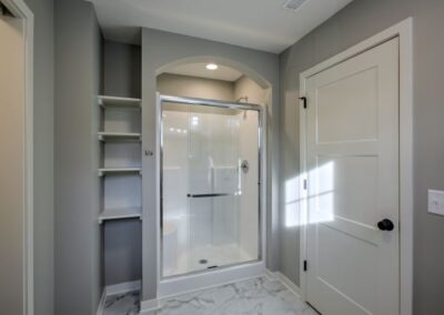 bathroom, shower room with glass door, bathroom shelves