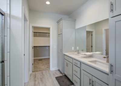 bathroom, white cabinets, bathroom sink drawers, mirror